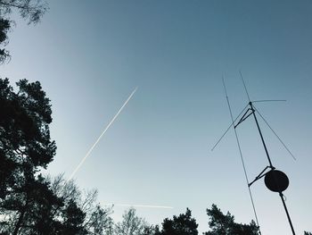 Low angle view of vapor trail against sky