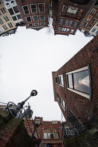 Low angle view of residential buildings against clear sky