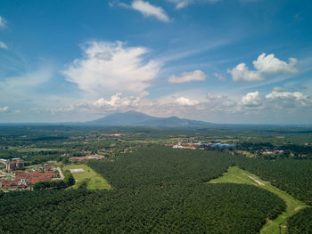 Aerial view of agricultural landscape against sky