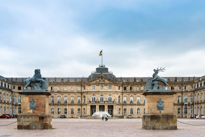 Statues in front of historic building