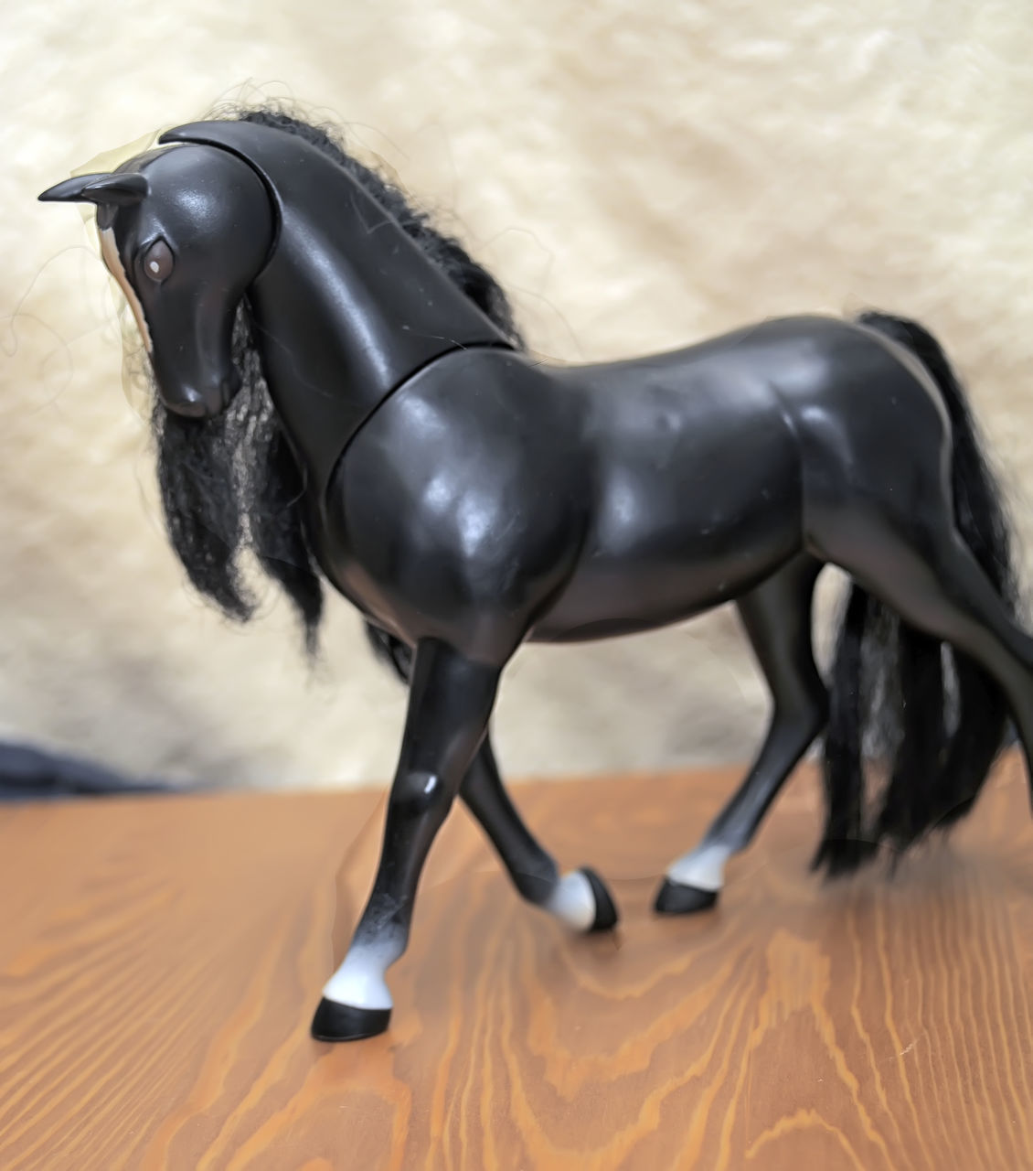 CLOSE-UP OF BLACK HORSE