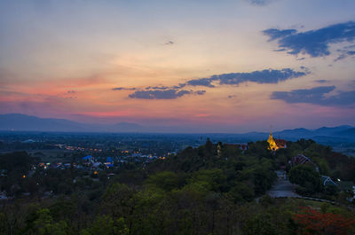 Scenic view of mountains against sky at sunset