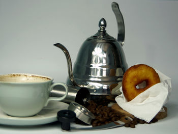 Close-up of coffee cup on table