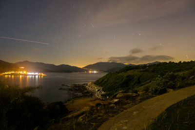 Scenic view of sea against sky at night