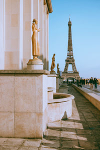 Statue of historic building against sky