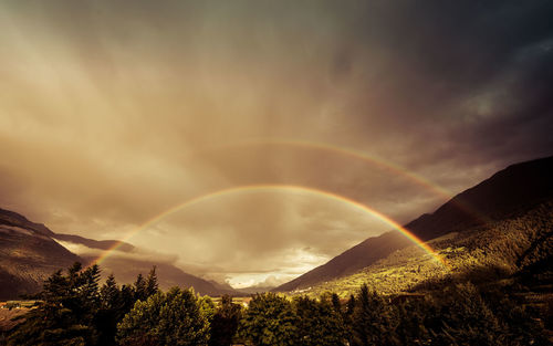 Scenic view of mountains against sky during sunset