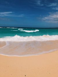 Scenic view of beach against sky