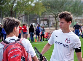 Rear view of man walking outdoors