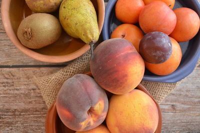 High angle view of fruits in basket on table