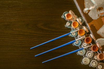 High angle view of various buttons on table