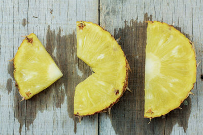 High angle view of fruit slices on cutting board