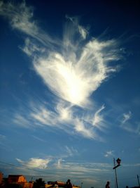 Scenic view of landscape against cloudy sky