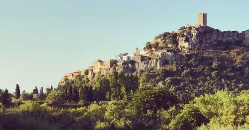 Panoramic view of cliff against clear sky