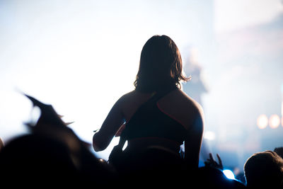 Silhouette people enjoying at music concert