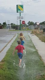 Woman walking on road