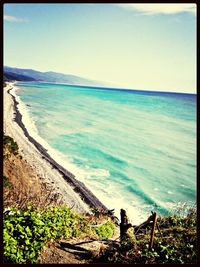 Scenic view of sea against clear sky