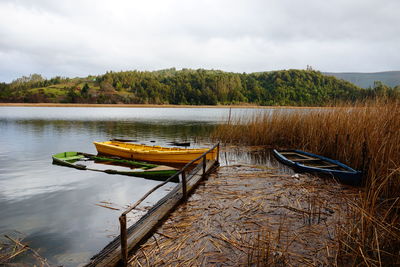 Boats in calm lake