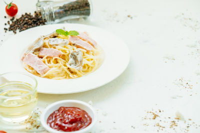 Close-up of meal served on table with ingredients