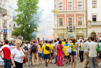 Group of people in front of building