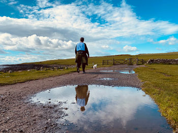 Woman walking in the countryside