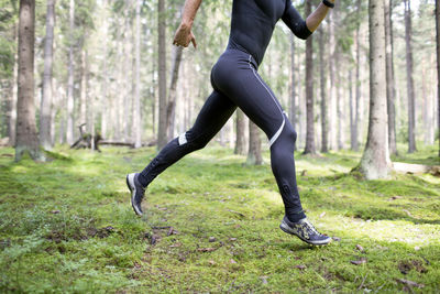 Man running in forest