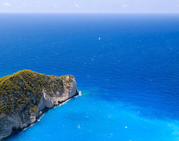 Scenic view of calm sea against clear sky