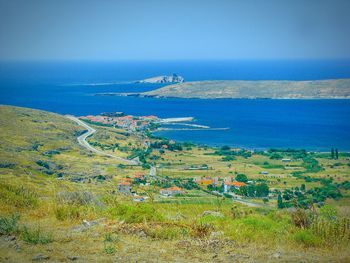 Scenic view of landscape against blue sky