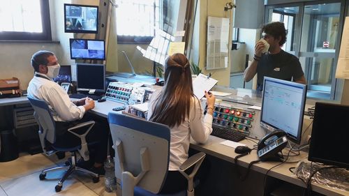Group of people working on table