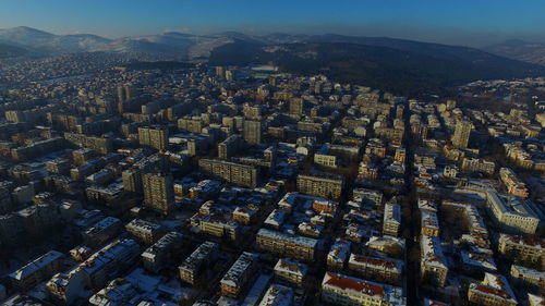 Aerial view of illuminated cityscape at night