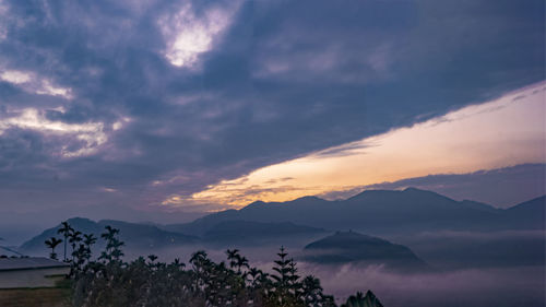 Scenic view of mountains against sky during sunset