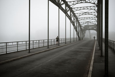 Bridge over road in city