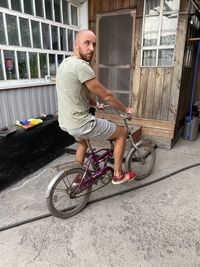 Portrait of man riding bicycle