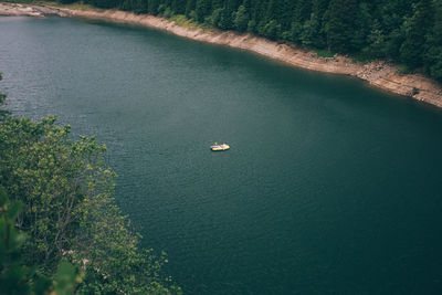 High angle view of boat sailing in river