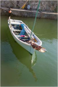 High angle view of boats moored in lake
