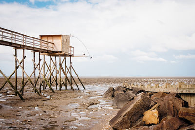 Lifeguard hut on beach against sky. fishery hut on beach. 