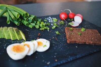 Close-up of vegetables on cutting board