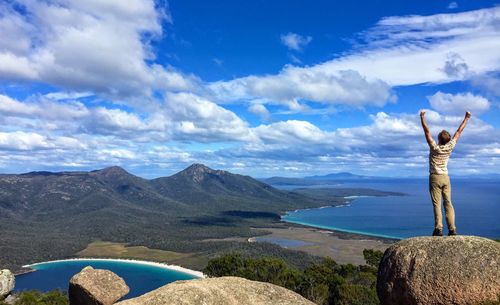 Scenic view of mountains and rocks against sky