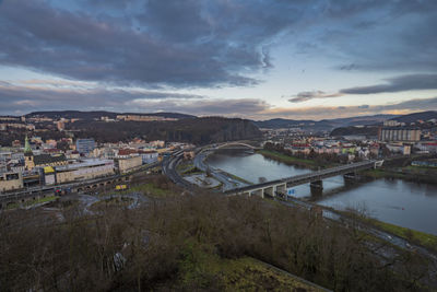 High angle view of bridge over river against sky during sunset