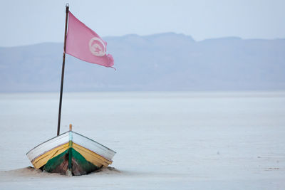 Flag on boat at chott el djerid