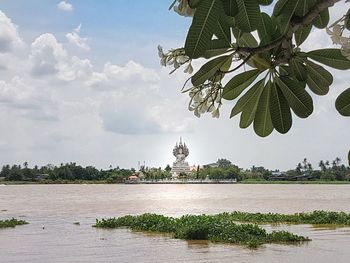 View of temple against cloudy sky