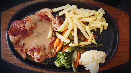 Close-up of food served in plate on table