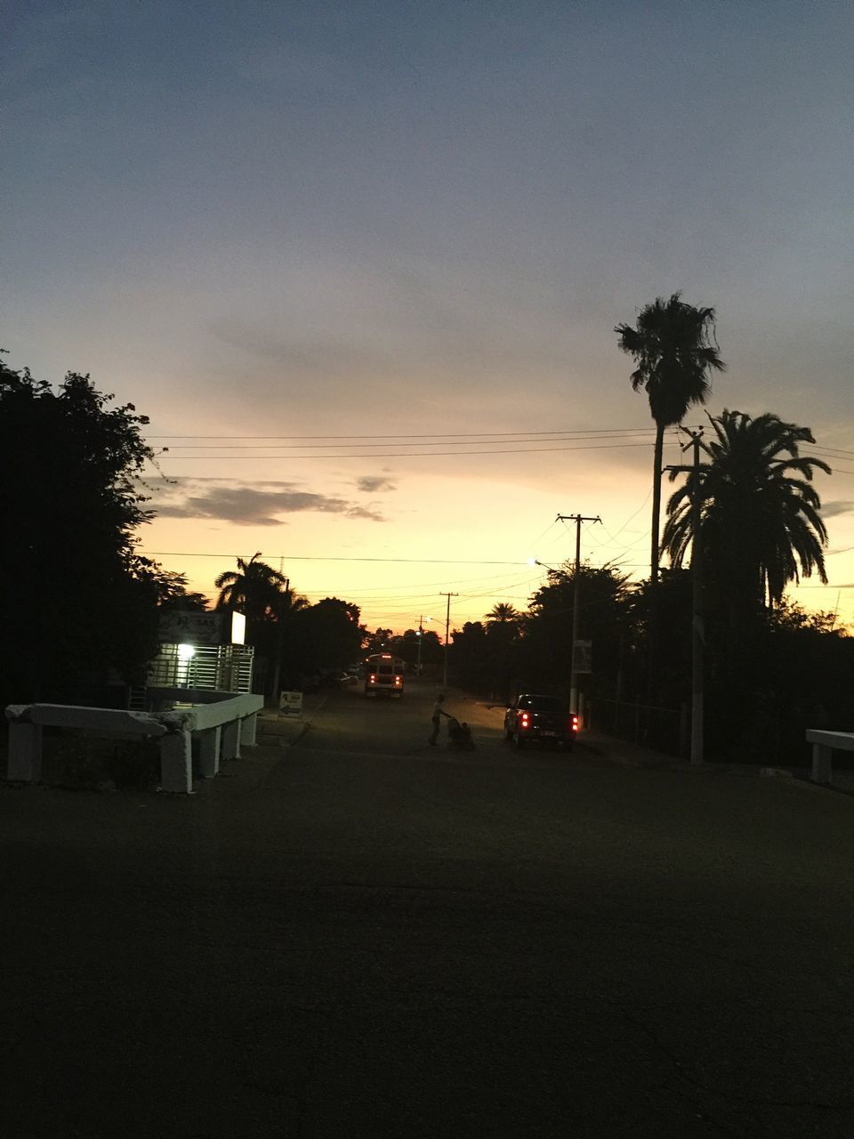 ROAD AGAINST SKY DURING SUNSET