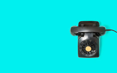 Close-up of black telephone