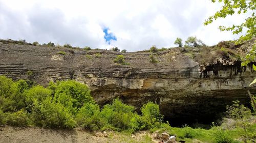 Panoramic view of farm against sky