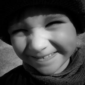 Close-up portrait of smiling boy