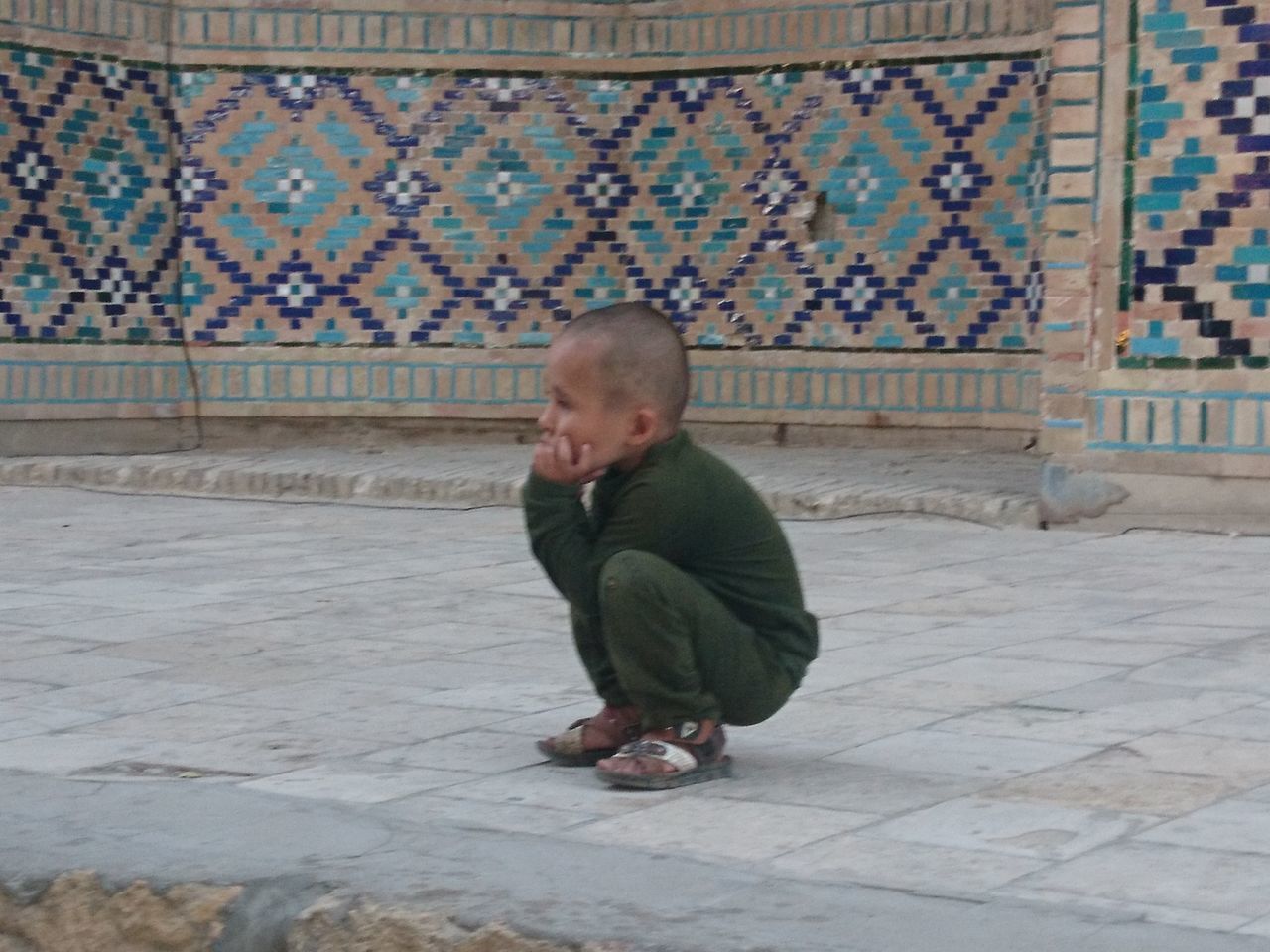 FULL LENGTH OF BOY ON WALL