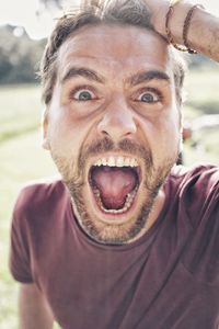 Close-up portrait of man wearing mask