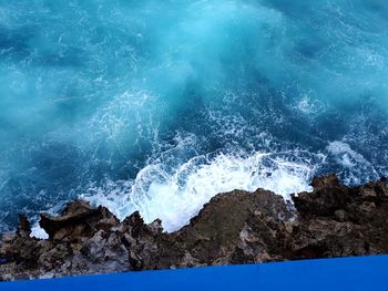 Waves splashing on rocks