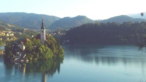 Scenic view of lake with mountains in background