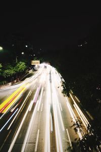 High angle view of light trails on street at night